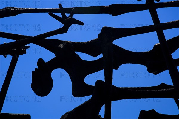 Dachau World War II Nazi Concentration Camp Memorial Site. Detail of 1968 Memorial by Yugoslavian artist and concentration camp survivor Nandor Glid. Photo: Hugh Rooney