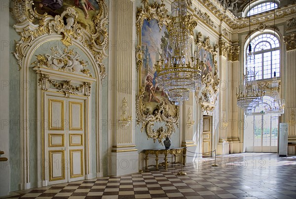 Nymphenburg Palace. Interior of Steinerner Saal the Stone or Great Hall with gold and painted baroque decoration and ornate chandeliers. Photo : Hugh Rooney