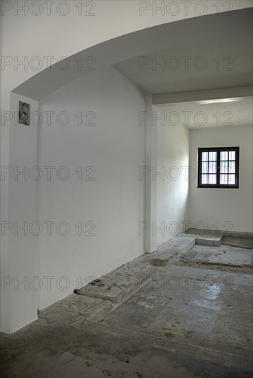 Dachau World War II Nazi Concentration Camp Memorial Site. Empty interior of reconstructed prisoner barracks. Photo : Hugh Rooney