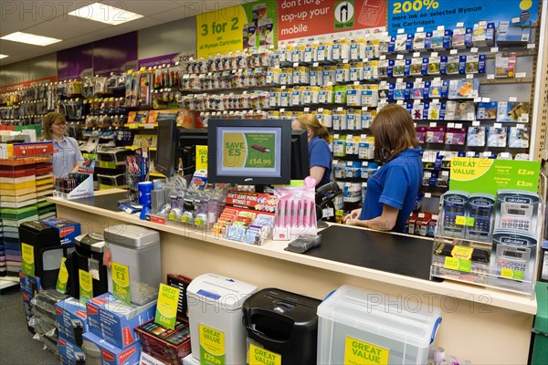 Rymans office stationery store with manageress and two female shop assistants behind counter. Photo: Paul Seheult