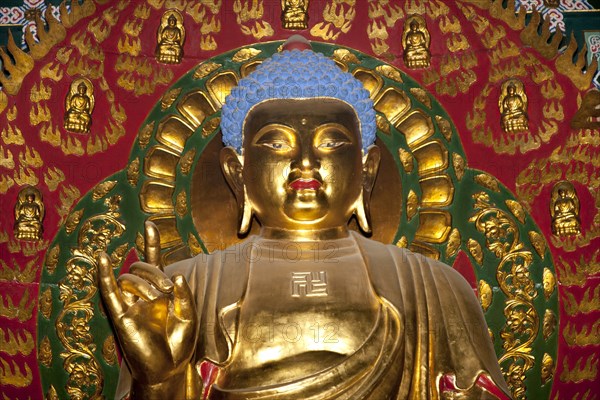 A golden Buddha Shaolin Temple birthplace of Kung Fu Song Shan near Zhengzhou. Photo : Mel Longhurst