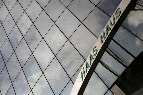 Exterior detail of the Haas Building or Haas Haus. Modern glass fronted and concrete office building in Saint Stephens Square. Photo: Bennett Dean