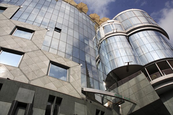 Exterior detail of the Haas Building or Haas Haus. Modern glass fronted and concrete office building in Saint Stephens Square. Photo: Bennett Dean