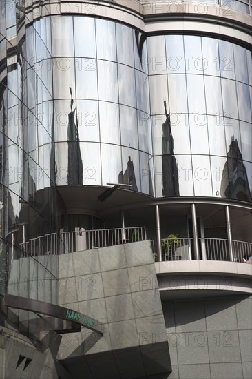 Exterior detail of the Haas Building or Haas Haus. Modern glass fronted and concrete office building in Saint Stephens Square. Photo : Bennett Dean