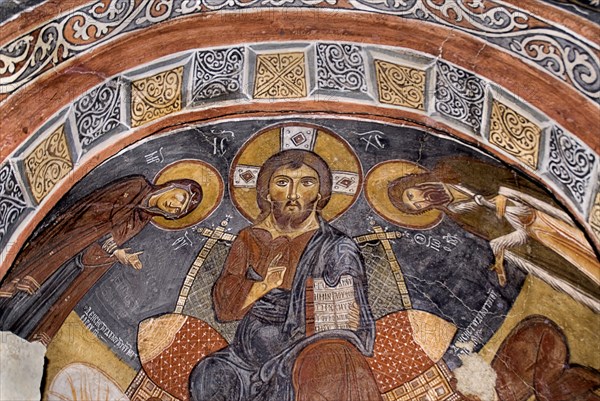 Open Air Museum. The Dark Church so named because it had few windows. Detail of fresco dating from the eleventh century depicting Christ as Pantocrator. The Dark Church is known in Turkish as Karanlik Kilise. Photo : Hugh Rooney