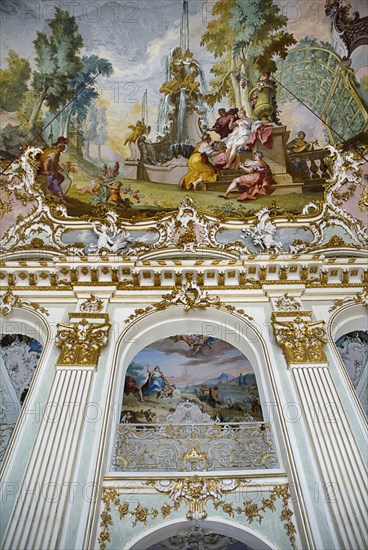 Nymphenburg Palace. Interior of Steinerner Saal the Stone or Great Hall with detail of painted ceiling by Johann Baptist Zimmermann and gold and white baroque decoration by Francois de Cuvillies. Photo : Hugh Rooney