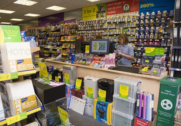 Rymans office staionery store with two female shop assistants behind counter. Photo : Paul Seheult