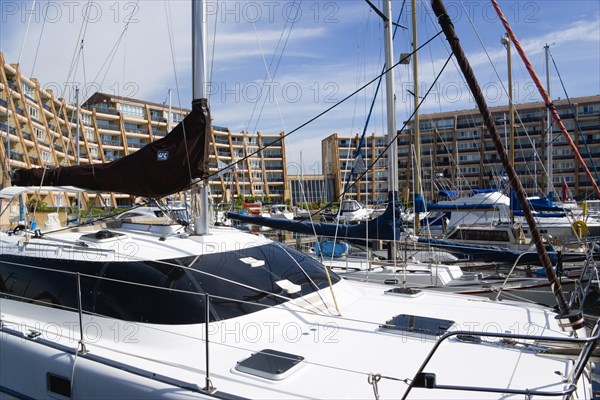 Port Solent with boats moored in the Marina surrounded by apartment buildings. Photo: Paul Seheult