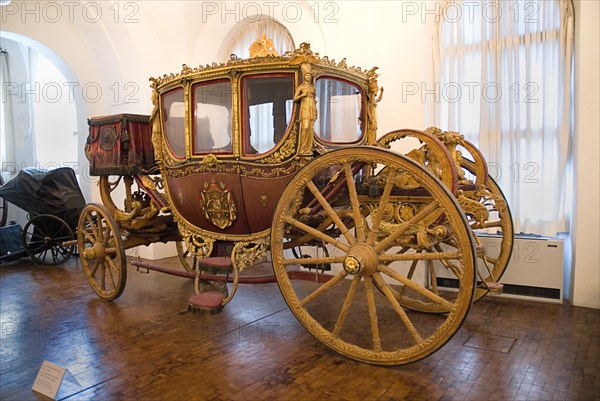 Nymphenburg Palace Marstall Museum. Highly ornate gold and painted coach made for the coronation of King Max I Joseph in 1818. Photo: Hugh Rooney