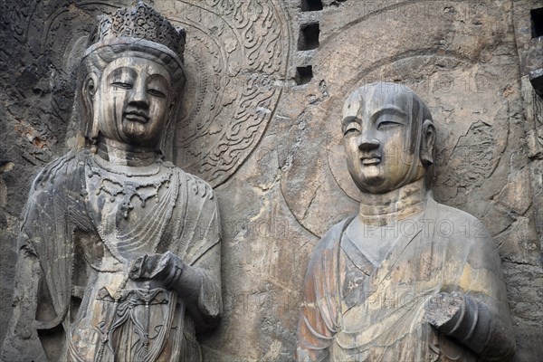 Carved Buddhist statues Fengxian Temple Tang Dynasty Longmen Grottoes and Caves. Photo: Mel Longhurst