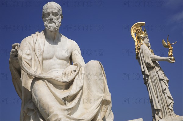 Statues of the Greek historian Polybius and Athena on the right in front of Parliament building. Photo : Bennett Dean
