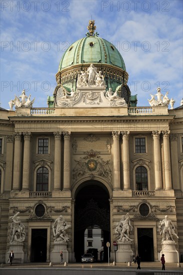 Hofburg Palace. Part view of exterior facade with domed roof above entrance archway.. Photo: Bennett Dean