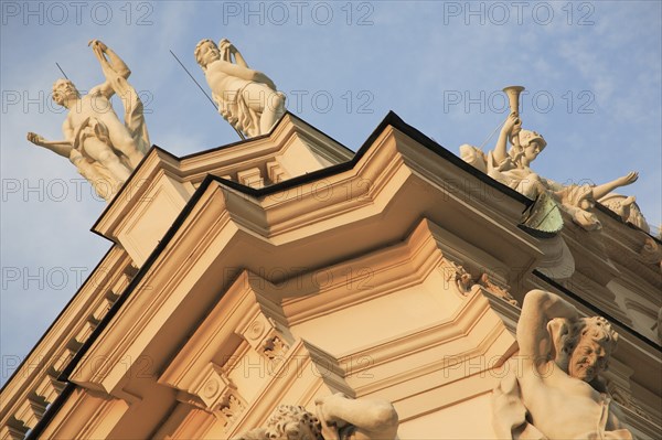 Detail of Belvedere Palace exterior with carvings and roof statues. Photo: Bennett Dean