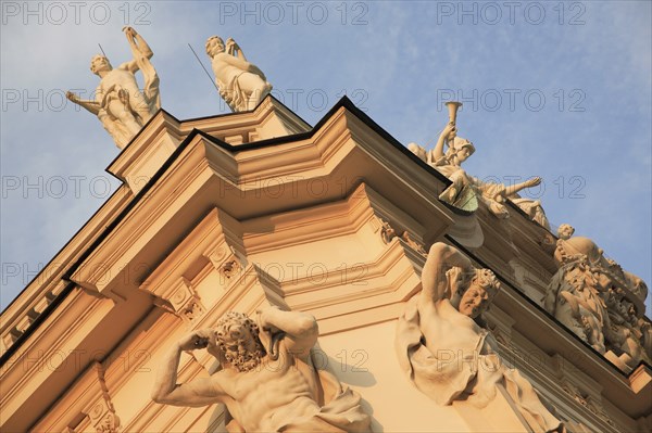 Detail of Belvedere Palace exterior with carvings and roof statues. Photo: Bennett Dean