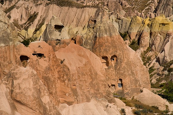 Red Valley. Hacli Kilise or The Church of the Cross. Exterior of rock cut cave church in volcanic tufa landscape on the North rim of the Red Valley. Photo : Hugh Rooney