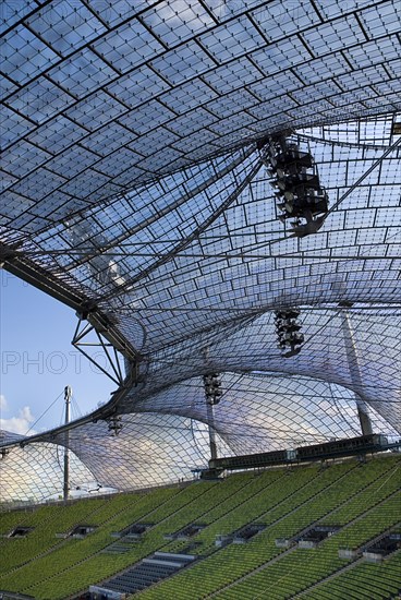 Olympic Stadium built as the main venue for the 1972 Summer Olympics. View along seating beneath large sweeping canopies of acrylic glass stabilised by steel cables meant to represent the Alps. Photo : Hugh Rooney