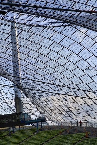 Olympic Stadium built as the main venue for the 1972 Summer Olympics. View along seating beneath large sweeping canopies of acrylic glass stabilised by steel cables meant to represent the Alps. Photo : Hugh Rooney