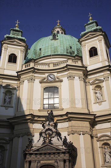 St Peters Church. Part view of exterior with dome and twin towers. Thought to occupy the oldest Christian sacred site in Vienna. Building dates from 1702. Photo: Bennett Dean