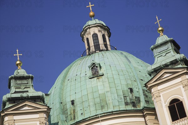 St Peters Church detail of green domed roof and tower tops. Thought to occupy the oldest Christian sacred site in Vienna. Building dates from 1702. Photo : Bennett Dean