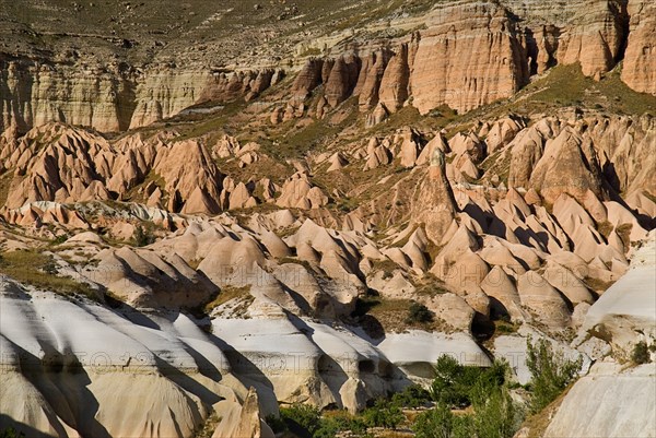 Rose and Red Valleys the Church of the Three Crosses. Rock cut cave church amongst ochre and white rock formations of volcanic tufa landscape. Photo: Hugh Rooney