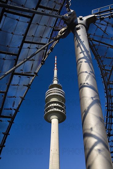 Olympic Tower or Olympiaturm framed by stadium architecture. Photo : Hugh Rooney