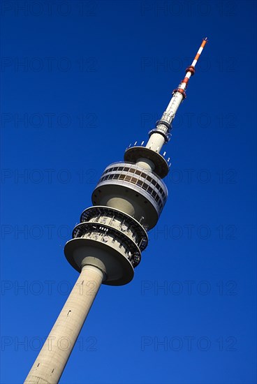 Olympic Tower or Olympiaturm. Angled view of top of tower against cloudless blue sky. Photo : Hugh Rooney