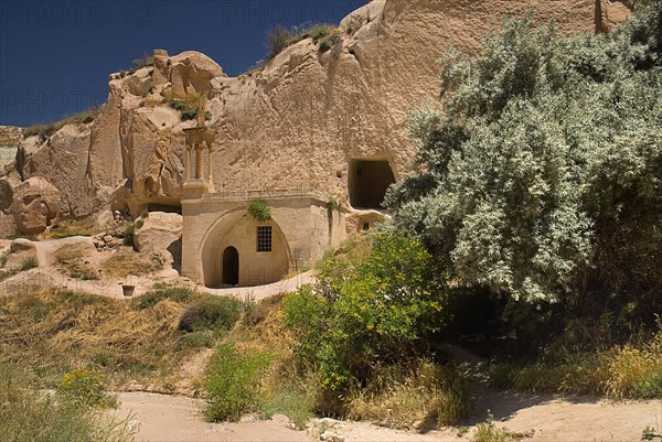 Zelve Open Air Museum. Abandoned monastic cave town inhabited until 1952 when the valley was deemed too dangerous to live in any more. Small unadorned rock cut mosque. Photo : Hugh Rooney