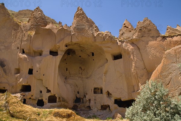 Zelve Open Air Museum. Abandoned monastic cave town inhabited until 1952 when the valley was deemed too dangerous to live in any more. Monastery complex incorporating deep bowl shape cut out of the rock. Photo : Hugh Rooney