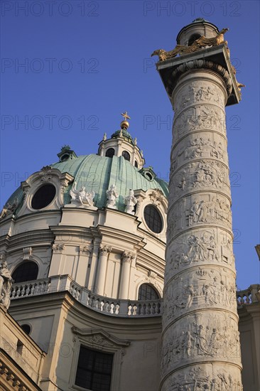 Karlskirche or Church of St Charles Borromeo. Part view of exterior with ellipsoid dome and column. Photo : Bennett Dean