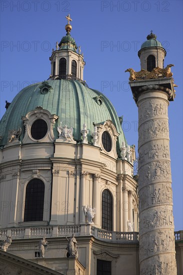 Karlskirche or Church of St Charles Borromeo. Part view of exterior with ellipsoid dome and column. Photo: Bennett Dean