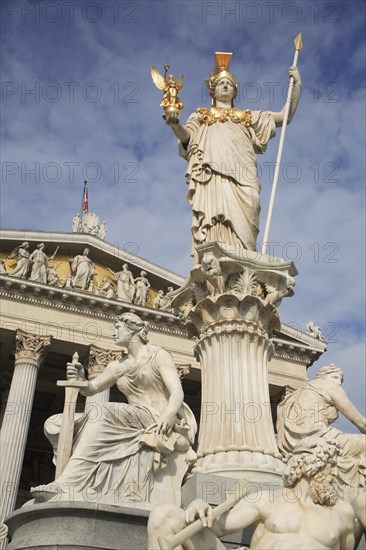 Statue of Athena elevated on column above fountain in front of the Parliament building. Photo: Bennett Dean