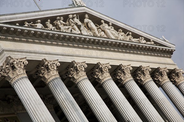 Parliament building. Detail of colonnaded entrance and carved pediment. Photo : Bennett Dean