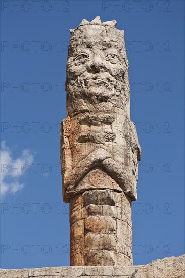 Naxi tribe stone carving at cable car station at base of Yulong Xue Shan Mountain. Photo: Mel Longhurst