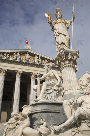 Statue of Athena raised on pillar above fountain in front of the Parliament building. Photo: Bennett Dean