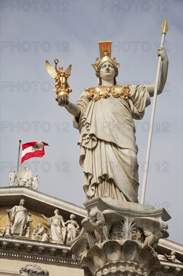 Statue of Athena raised on pillar above fountain in front of the Parliament building. Photo : Bennett Dean