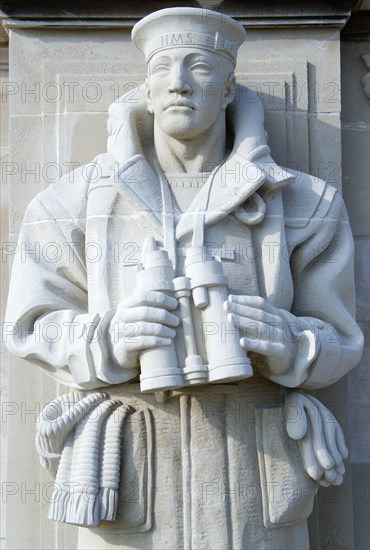 World War Two Naval Memorial on Southsea seafront designed by Sir Edmund Maufe with sculpture by Sir Charles Wheeler of a sailor holding binoculars. Photo : Paul Seheult
