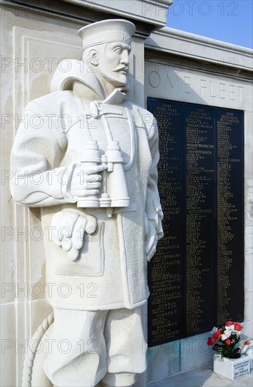 World War Two Naval Memorial on Southsea seafront designed by Sir Edmund Maufe with sculpture by Sir Charles Wheeler of a sailor holding binoculars. Photo : Paul Seheult