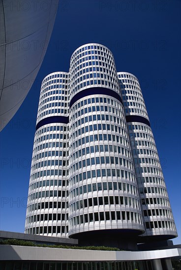 BMW Headquarters exterior with the BMW Tower which stands 101 metres tall and mimics the shape of tyres.. Photo: Hugh Rooney