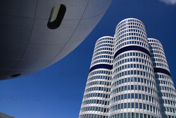 BMW Headquarters exterior. Part view of the BMW Tower which stands 101 metres tall and mimics the shape of tyres.. Photo: Hugh Rooney