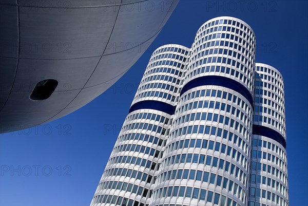 BMW Headquarters exterior. Angled part view of the BMW Tower which stands 101 metres tall and mimics the shape of tyres.. Photo: Hugh Rooney