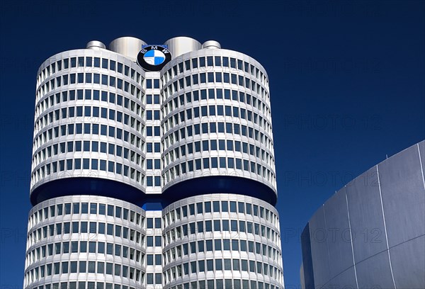 BMW Headquarters exterior. Part view of the BMW Tower which stands 101 metres tall and mimics the shape of tyres.. Photo : Hugh Rooney