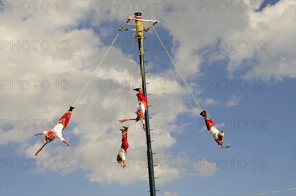 Mexico, The Bajio, Zacatecas, Voladores de Papantla show during Feria. 
Photo : Nick Bonetti