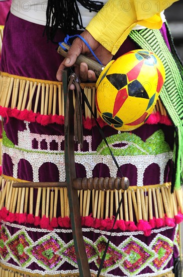 Mexico, Bajio, Zacatecas, Indigenous dance group detail of dress and musical instrument. 
Photo : Nick Bonetti