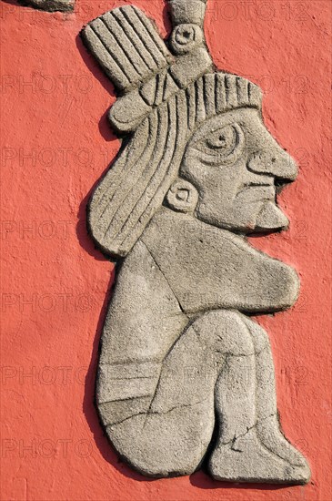 Mexico, Veracruz, Papantla, Detail of relief carving of Totonac figures on the Mural Cultural Totonaca in the Zocalo. 
Photo : Nick Bonetti