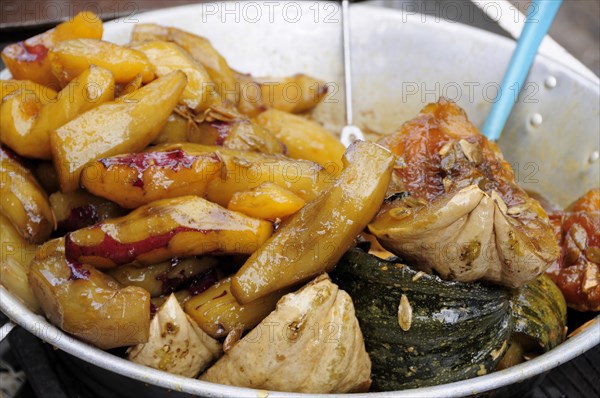 Mexico, Michoacan, Patzcuaro, Bowl of candied squash and yam or camote. 
Photo : Nick Bonetti