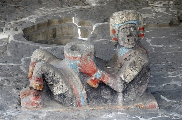 Mexico, Federal District, Mexico City, Chac Mool figure at the entrance to Tlaloc Shrine in the Templo Mayor Aztec temple ruins. 
Photo : Nick Bonetti