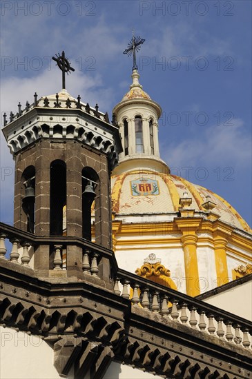 Mexico, Jalisco, Guadalajara, Architectural detail of roof dome and bell tower of the Church of Santa Maria. 
Photo : Nick Bonetti
