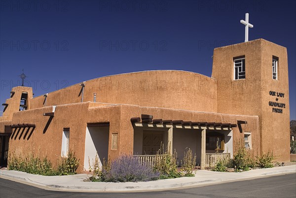 USA, New Mexico, Taos, Our Lady of Guadalupe Parish Church built in the typical adobe style architecture. 
Photo : Hugh Rooney