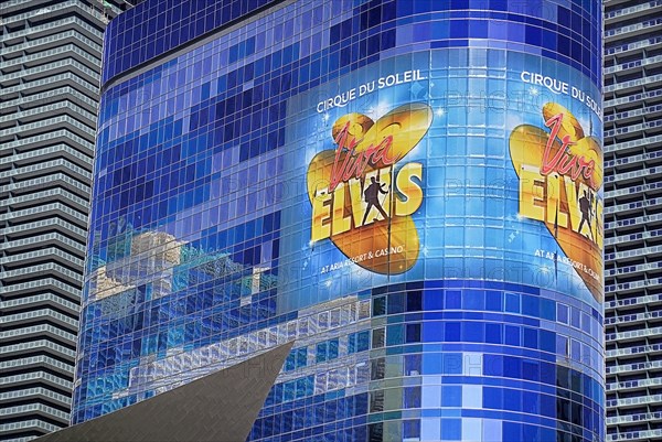 USA, Nevada, Las Vegas, The Strip Cirque du Soleil Viva Elvis show being advertised on the exterior of the Aria resort hotel. 
Photo : Hugh Rooney