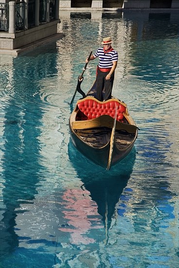 USA, Nevada, Las Vegas, The Strip gondola outside side the entrance to the Venetian hotel and casino. 
Photo : Hugh Rooney